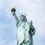 shallow focus photo of Statue of Liberty