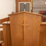brown wooden cabinet with stainless steel handle