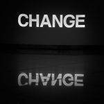 a black and white photo of the word change