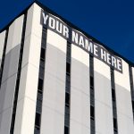 gray and black building under blue sky during daytime