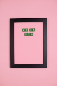 Green Scrabble Tiles Inside the Black Wooden Frame